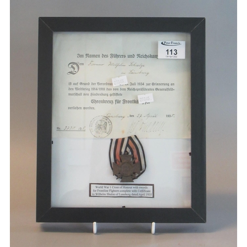 113 - German WWI Cross of Honour with swords Willhelm Shulze dated 1935 framed and glazed.
(B.P. 21% + VAT... 