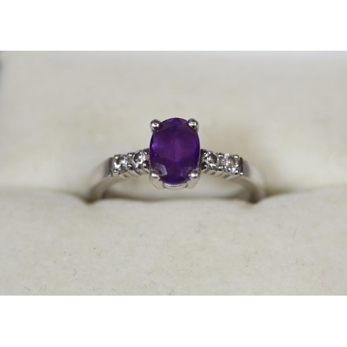 273 - Platinum amethyst and diamond ring.  Ring size I & 1/2.  Approx weight 4.3 grams.
(B.P. 21% + VAT)