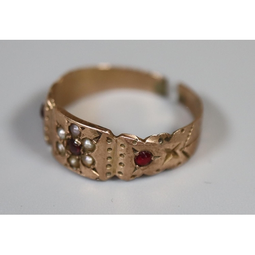 276 - 9ct gold engraved ring set with seed pearls and garnets.  Cut.  Approx weight 1.3 grams.
(B.P. 21% +... 