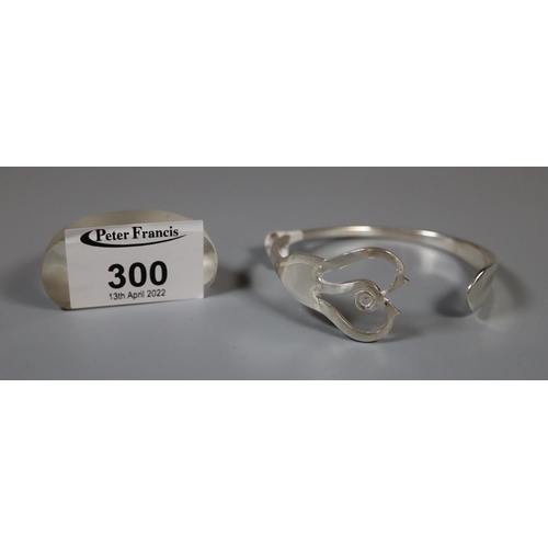 300 - Silver bangle fashioned from an antique fork.  Approx weight 26.5 grams.
(B.P. 21% + VAT)