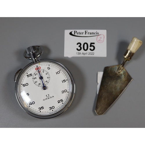 305 - Omega chrome plated stopwatch with Arabic numerals and white face, together with a small, silver bon... 