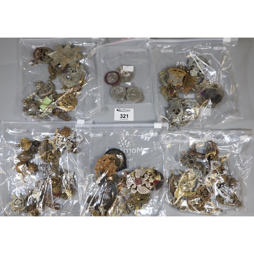 321 - Large bag of appearing mainly British military cap badges various.
(B.P. 21% + VAT)