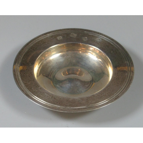 327 - Small silver pin dish of circular form. London hallmarks. 1.95oz troy approx.
(B.P. 21% + VAT)
