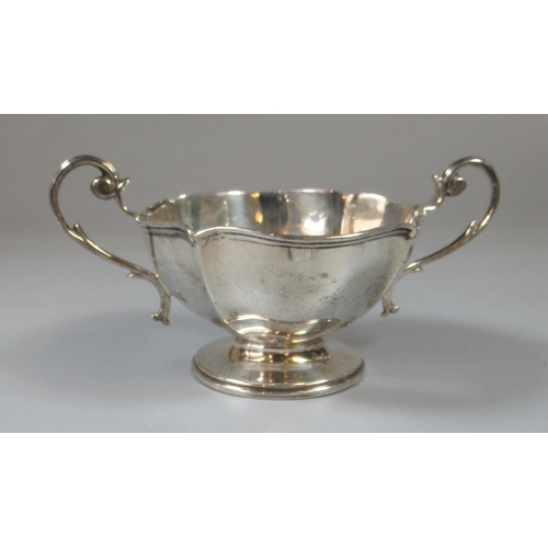 329 - 20th century silver two-handled pedestal bowl. Birmingham hallmarks. 3.95oz troy approx.
(B.P. 21% +... 