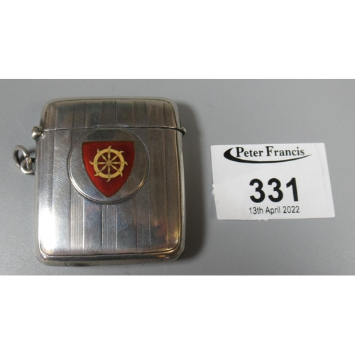 331 - Unusual silver vesta case with enamelled armorial of a ship's wheel. Birmingham, 1910.
(B.P. 21% + V... 