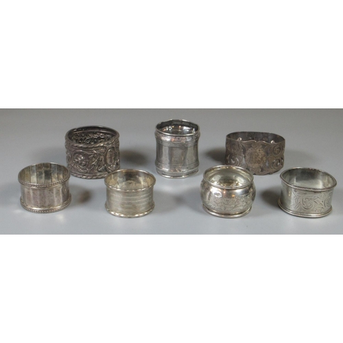 337 - Collection of seven silver napkins rings, some with ornate decoration. 5.1oz troy approx.
(B. P. 21%... 
