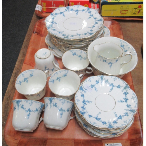 399 - Tray of 19th century china tea ware on a white ground with blue printed ivy design.
(B.P. 21% + VAT)