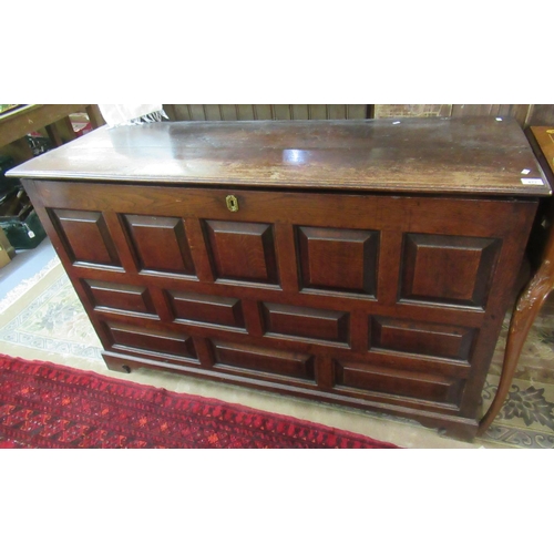 477 - 18th century Welsh oak coffer having twelve square and rectangular fielded and moulded panels, stand... 