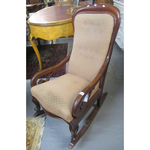 512 - Victorian mahogany button-back rocking armchair.
(B.P. 21% + VAT)