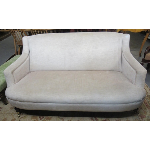 513 - Laura Ashley cream ground upholstered three seater sofa, raised on baluster turned supports, brass c... 