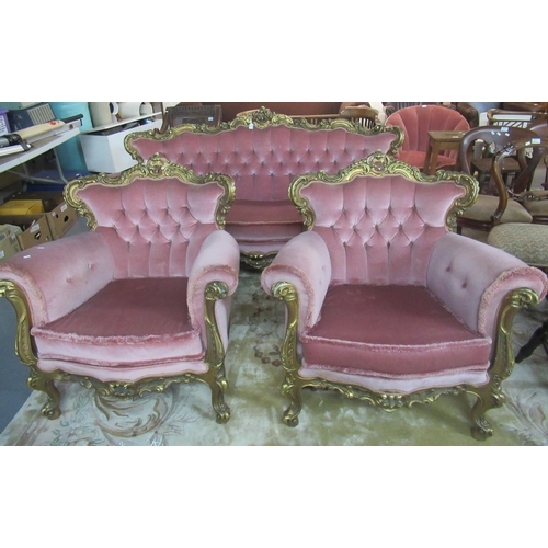 514 - Rococo style parlour suite, the ornately carved gilded gesso frame above button-back upholstered des... 