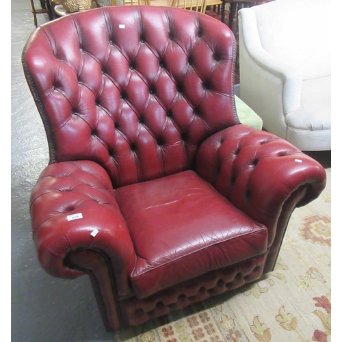 518 - Modern ox blood leather button-back Chesterfield style armchair.
(B.P. 21% + VAT)