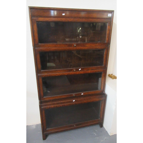 520 - Early 20th century oak Globe Wernicke style four sectional bookcase. 87 x 32 x 157cm approx.
(B.P. 2... 