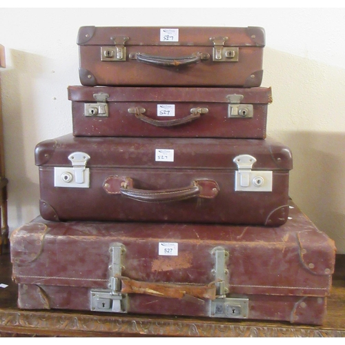 527 - Collection of four vintage suitcases. (4)
(B.P. 21% + VAT)