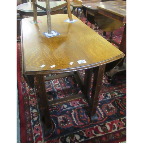 530 - Oak gate leg table on appearing associate base.
(B.P. 21% + VAT)