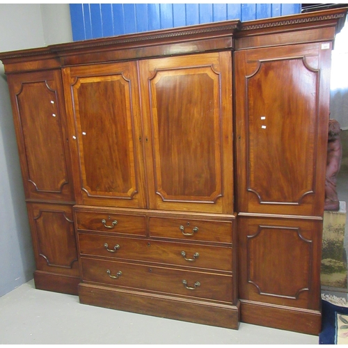 541 - 19th century mahogany gentleman's compactum break front wardrobe, the moulded cornice above two blin... 