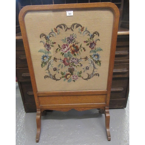 543 - Early 20th century oak framed tapestry floral and foliate fire screen on shaped legs.
(B.P. 21% + VA... 