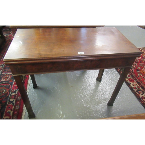 560 - 18th/19th century mahogany folding card table on square chamfered legs.
(B.P. 21% + VAT)