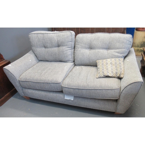 570 - Modern 2 Seater Grey Fabric 4 Cushion Sofa.
(B.P. 21% + VAT)