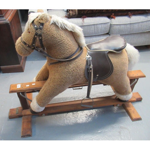 572 - Mamma & Papa's child's rocking horse on swing beech frame.
(B.P. 21% + VAT)