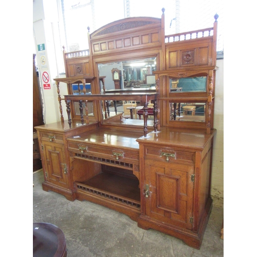 586 - Large late 19th/early 20th century oak mirror-backed sideboard with fluted arch pediment, an arrange... 