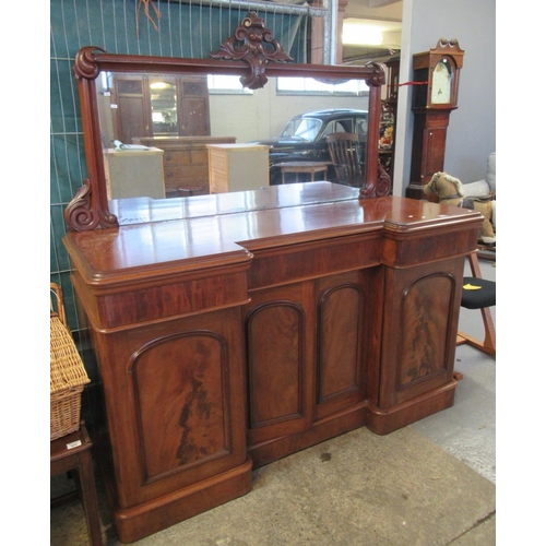 604 - Victorian mahogany mirror-backed sideboard with four cupboards to the base. 164cm wide approx.
(B.P.... 