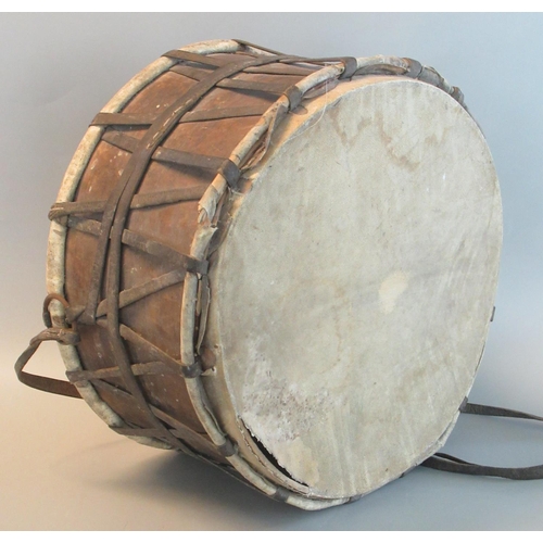 80 - Vintage tribal drum with leather banded decoration.
(B.P. 21% + VAT)