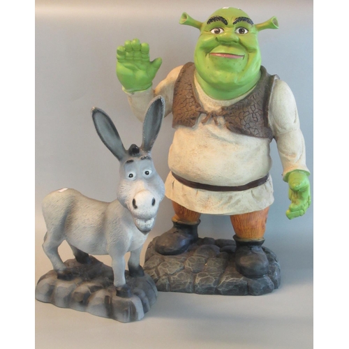 94 - Two novelty plastic film characters, Shrek and Donkey. (2)
(B.P. 21% + VAT)