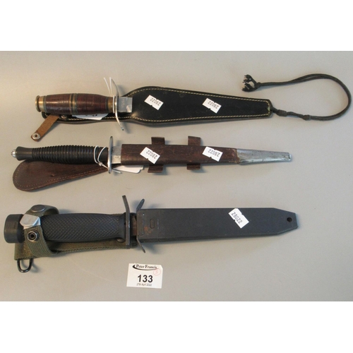 133 - Three fighting knives, one appearing British military with metal scabbard ,Sykes Fairbairn design wi... 