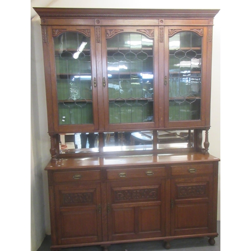 517 - Early 20th century oak art nouveau design dresser with enclosed lead glazed back over base with thre... 