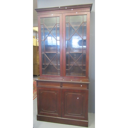 520 - Early 20th century mahogany two stage Georgian style bookcase with astragal glazed doors on moulded ... 