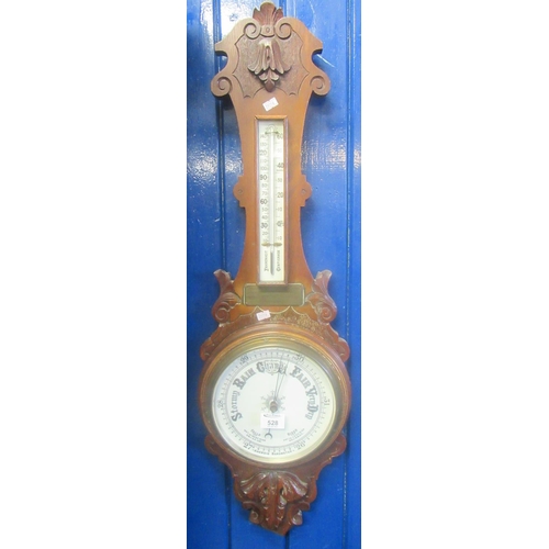 528 - Edwardian oak aneroid wheel barometer with moulded and carved decoration and presentation plaque.
(B... 