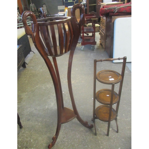 530 - Mahogany jardiniere stand with swan neck mounts and triangular under shelf, together with an oak, fo... 