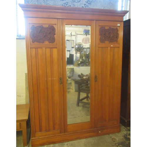 541 - Edwardian satin walnut mirrored-centre, two door wardrobe. 155cm wide approx.
(B.P. 21% + VAT)