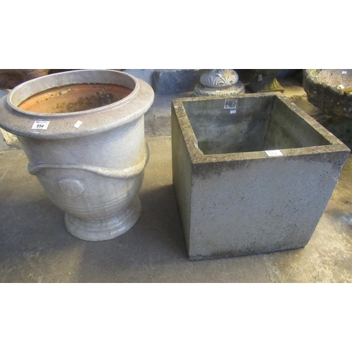 554 - Crackle glazed garden urn planter in oriental style.  52cm high approx.  Together with a square conc... 