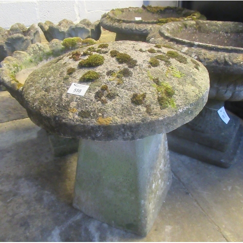 558 - Weathered composition staddle stone on associated later base.
(B.P. 21% + VAT)