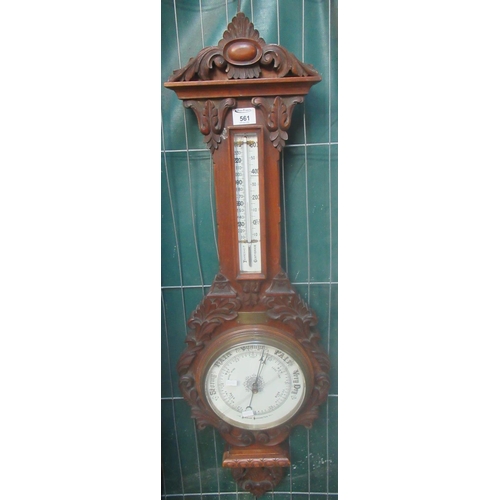 561 - Edwardian foliate framed aneroid wheel barometer.
(B.P. 21% + VAT)