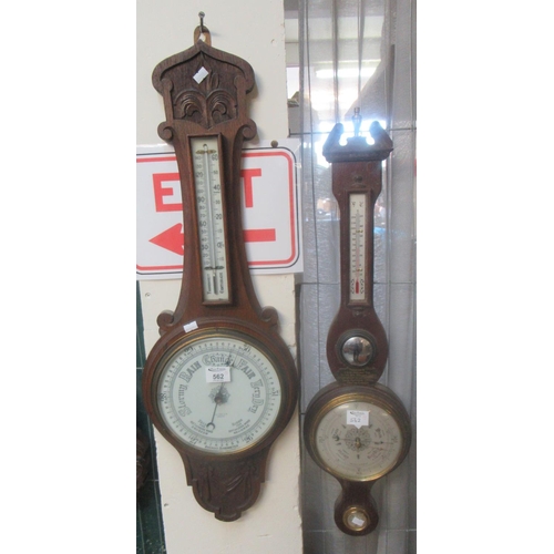 562 - Two wheel barometers.
(B.P. 21% + VAT)