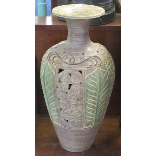 78 - Large modern stone ware baluster shaped pierced and relief decorated jar. 
(B.P. 21% + VAT)