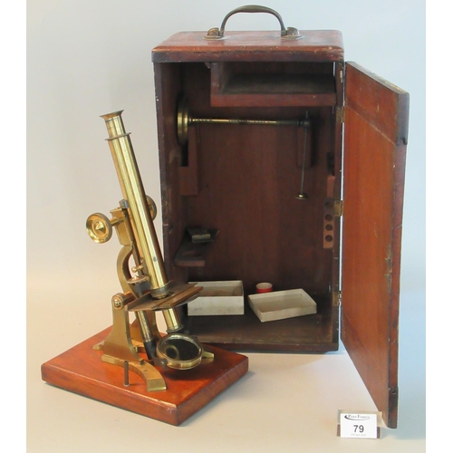 79 - Brass monocular microscope on mahogany base with fitted mahogany box.
(B.P. 21% + VAT)