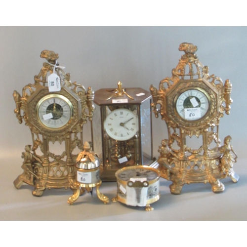 80 - Group of assorted modern brass and gilt metal clocks various. Include 100 day perpetual motion type,... 