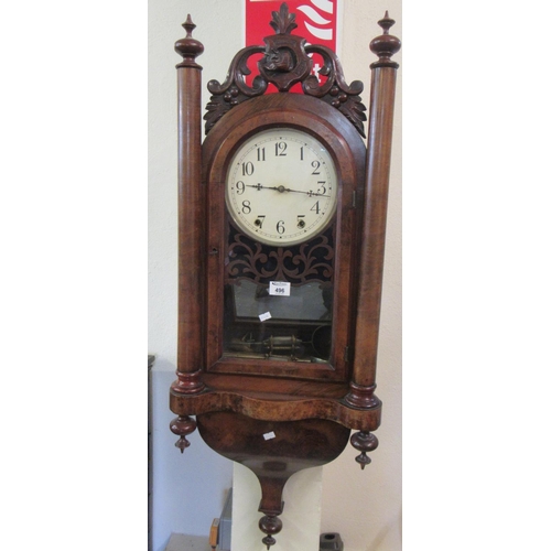 490 - Late Victorian walnut two-train wall clock with painted Arabic face and fox mask moulded pediment.
(... 