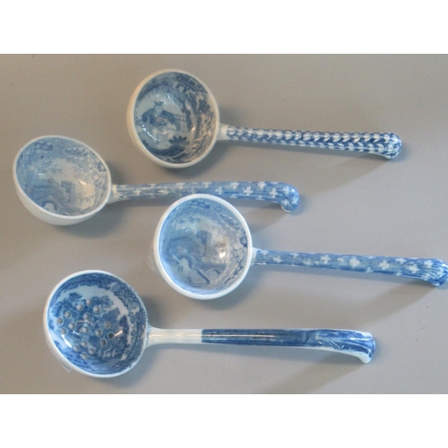 117 - Four 19thc Spode blue and white transfer printed china ladles/sifter,(3+1), to include Oriental boy ... 