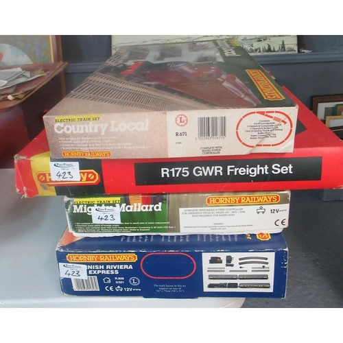 423 - Boxed Hornby Railways OO Gauge Electric train sets to include country local, GWR freight set, mighty... 