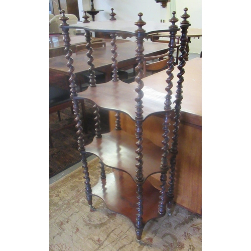 500 - Victorian mahogany 4 tier whatnot with shaped shelves and barley twist supports.  (B.P. 21% + VAT)