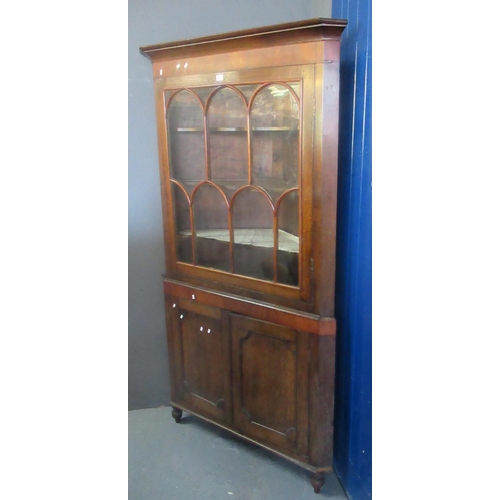 502 - Early 19th centruy Welsh oak two stage corner cupboard with glazed single door top having three fitt... 