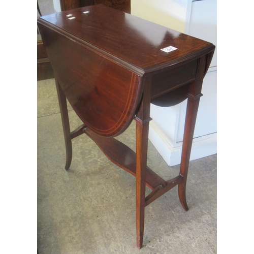 517 - Edwardian mahogany inlaid drop leaf table with shaped under tier on splay legs.
(B.P. 21% + VAT)