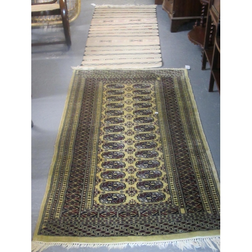 532 - Middle eastern design runner on a mustard ground with central geometric medallions together with ano... 