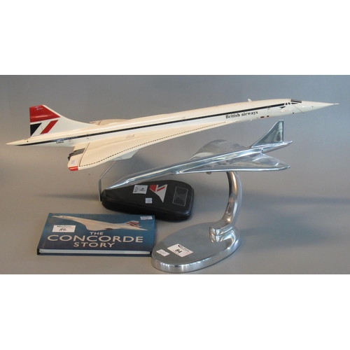 84 - Aluminium desk top model of Concorde on stand, by Nauticalia of London. 42cm long approx. Together w... 