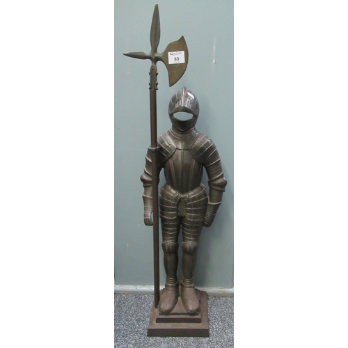 89 - Oxidised metal companion stand in the form of knight in armour with halberd, on square stepped base.... 